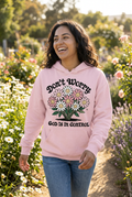 Don't Worry God is in Control light pink hoodie mockup