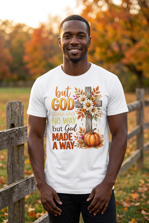 Black man wearing But God Made a Way Tee in white