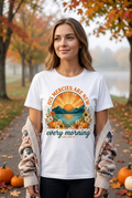Woman wearing His Mercies Are New Every Morning Tee in serene autumn morning setting