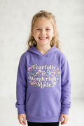 White girl in purple Fearfully & Wonderfully Made hoodie