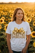 Woman wearing Mama Sunflower Gold Bow Tee in sunflower field