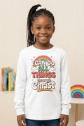 Black girl wearing I Can Do All Things Through Christ children's long sleeve tee
